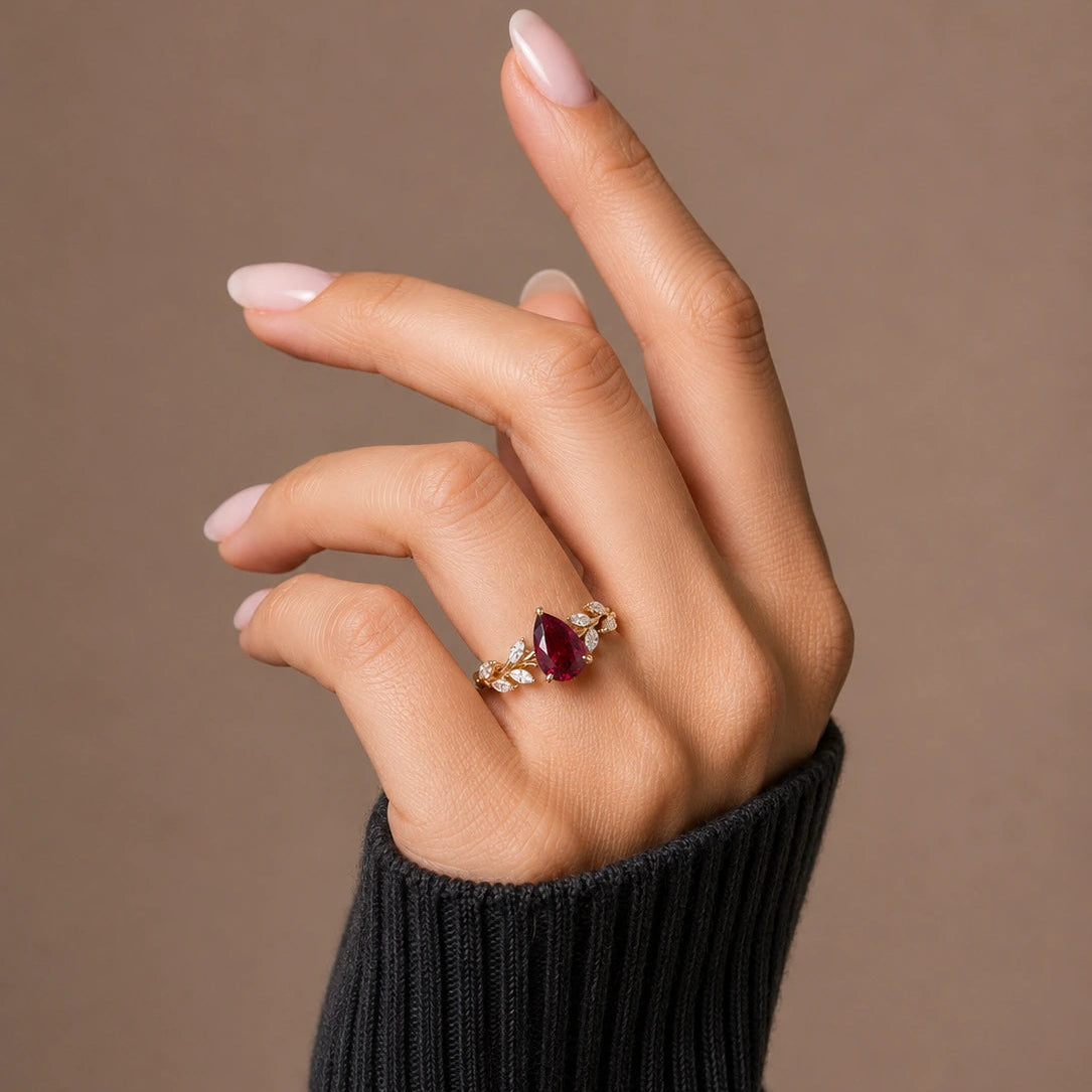 Pear Cut Red Ruby Nature Inspired Engagement Ring with Leaf Accents