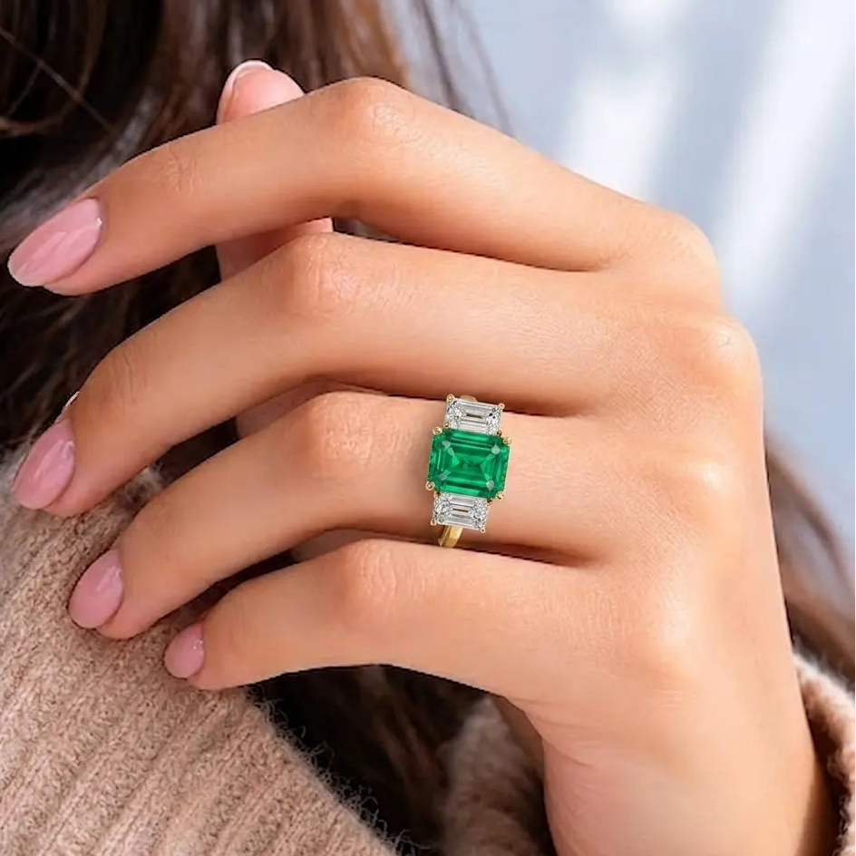 Emerald Cut Lab Grown Emerald Three Stone Engagement Ring with Emerald Side Stones