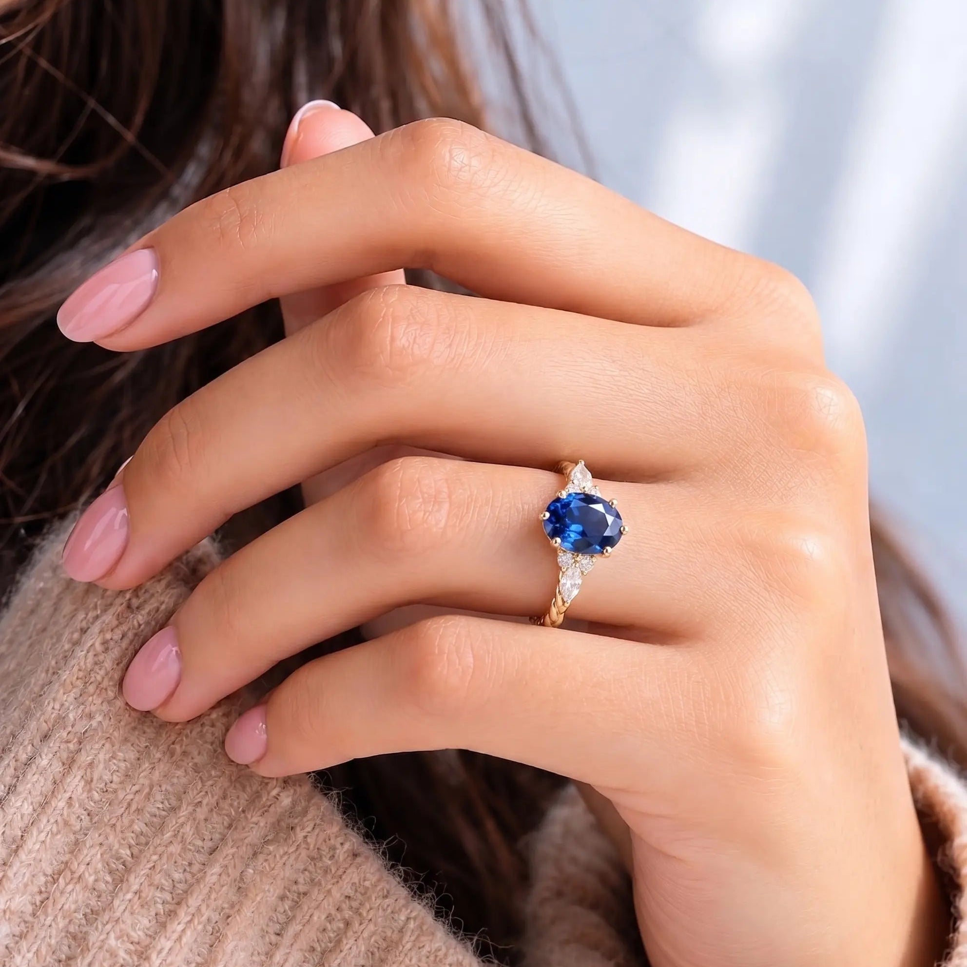 Oval Cut Blue Sapphire Ring with Marquise and Round Lab Grown Diamond Side Stones