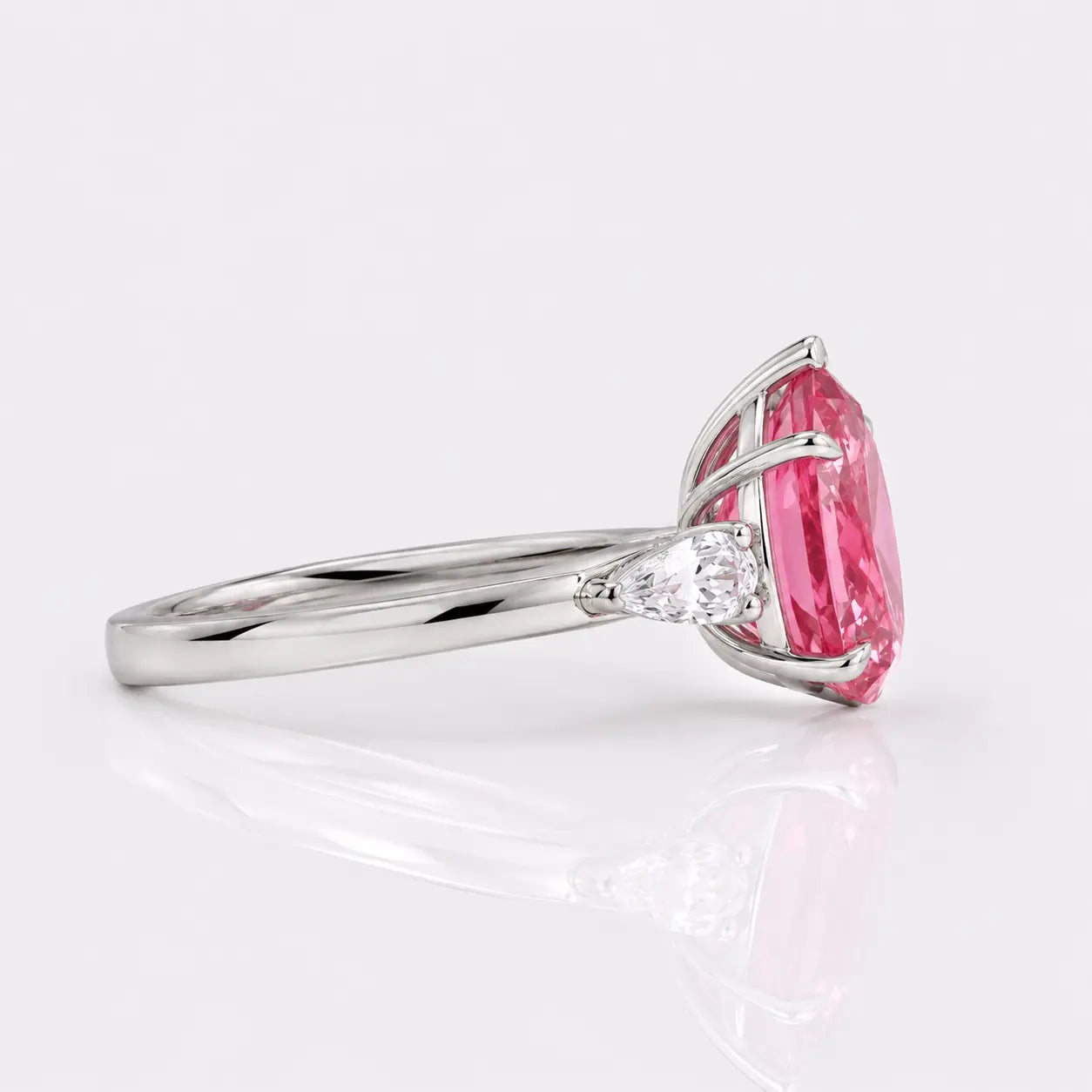 Oval Pink Sapphire Three Stone Lab Grown Diamond Engagement Ring with Pear Side Stones