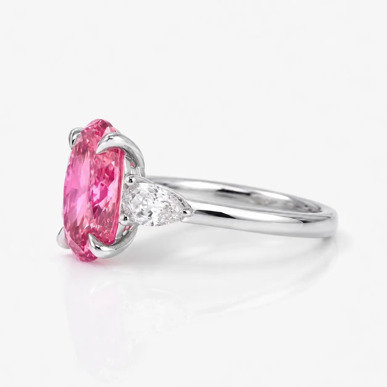 Oval Pink Sapphire Three Stone Lab Grown Diamond Engagement Ring with Pear Side Stones