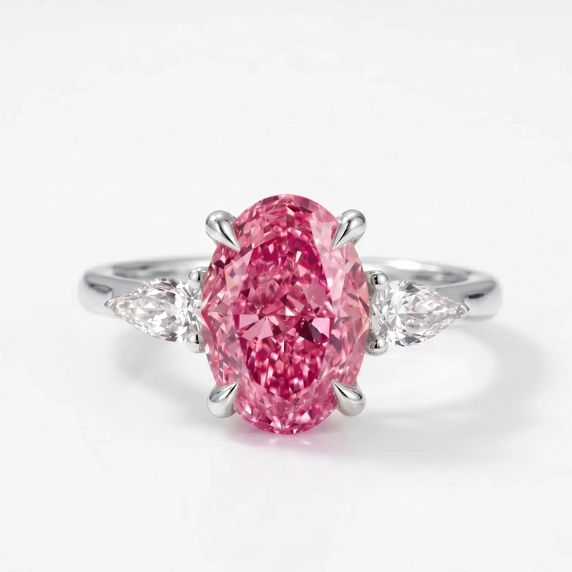 Oval Pink Sapphire Three Stone Lab Grown Diamond Engagement Ring with Pear Side Stones