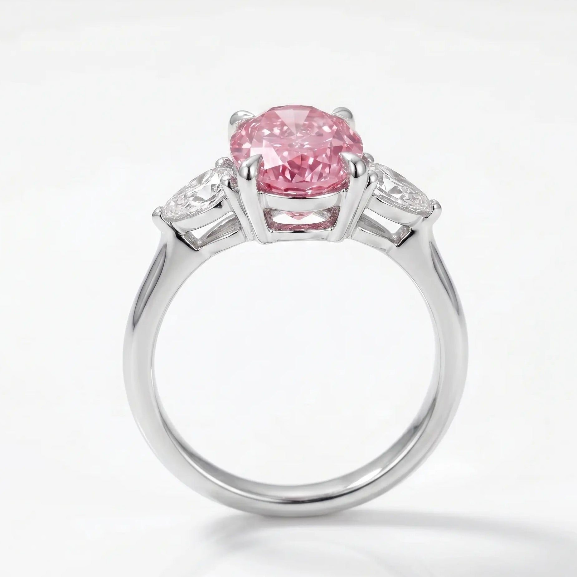 Oval Pink Sapphire Three Stone Lab Grown Diamond Engagement Ring with Pear Side Stones