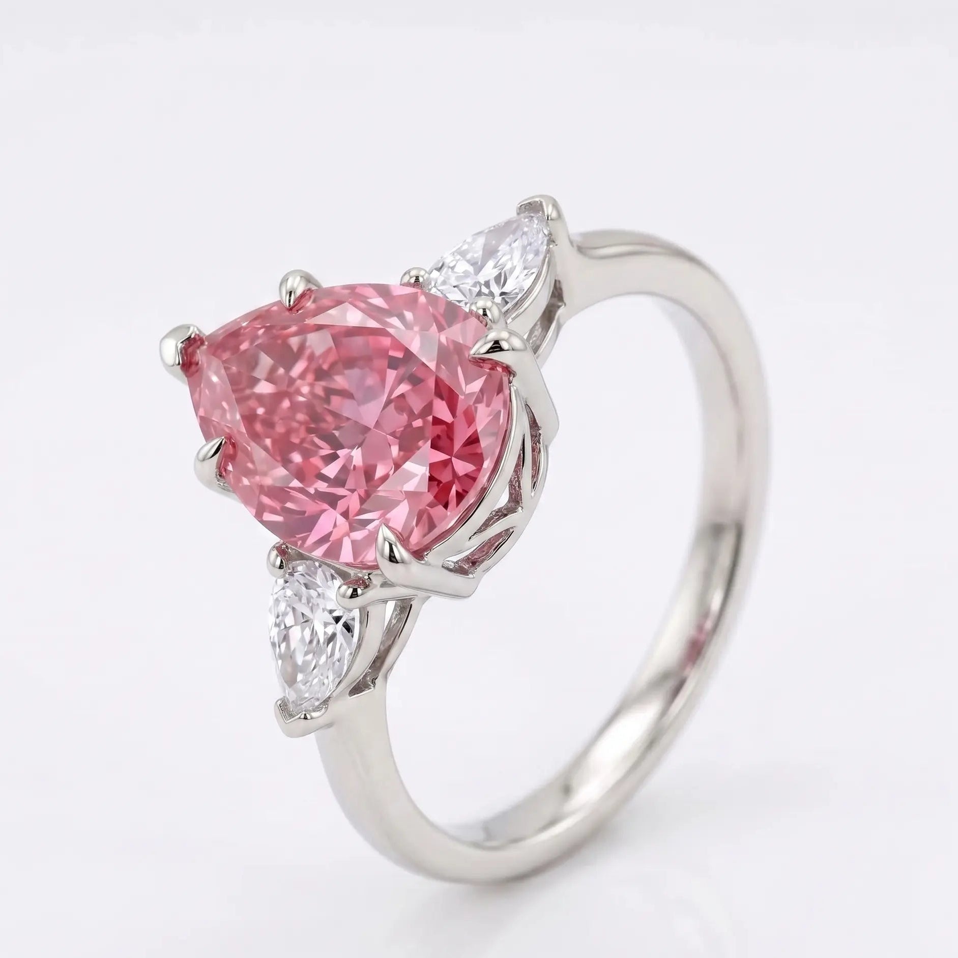 Pear Cut Morganite Engagement Ring with Trillion Diamond Side Stones