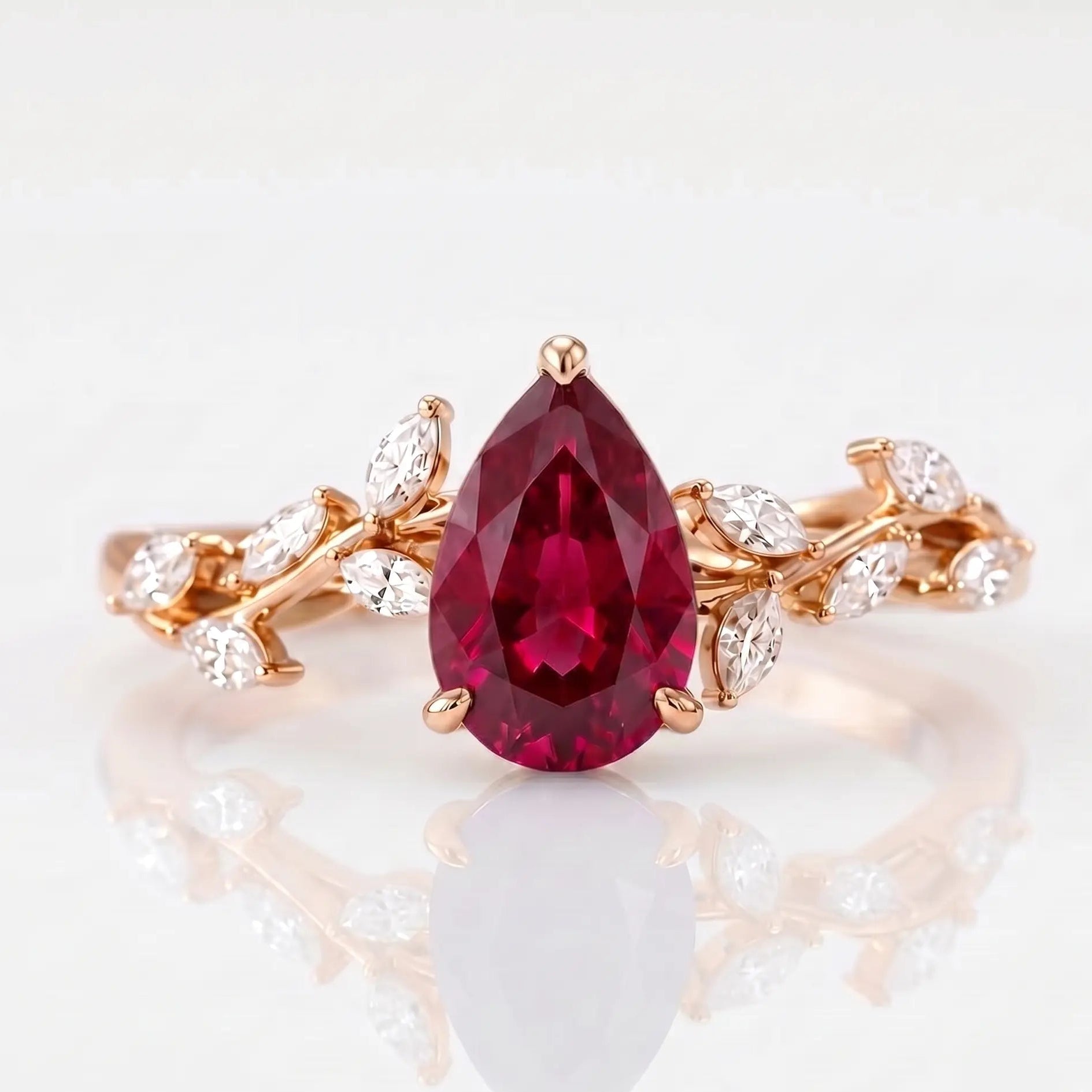 Pear Cut Red Ruby Nature Inspired Engagement Ring with Leaf Accents