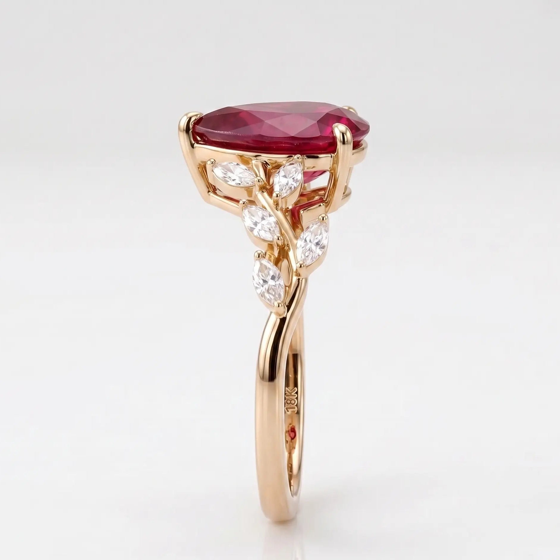 Pear Cut Red Ruby Nature Inspired Engagement Ring with Leaf Accents