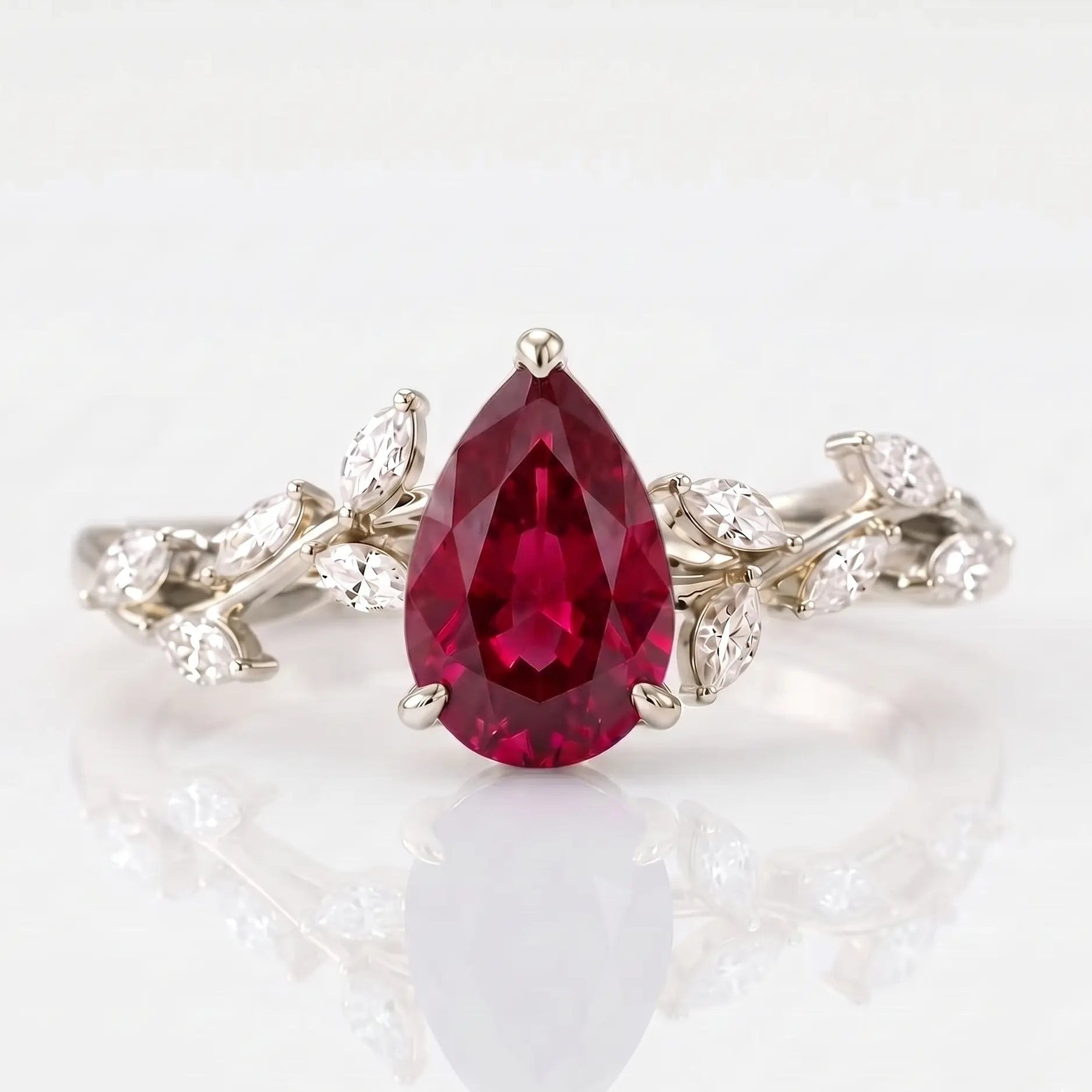 Pear Cut Red Ruby Nature Inspired Engagement Ring with Leaf Accents