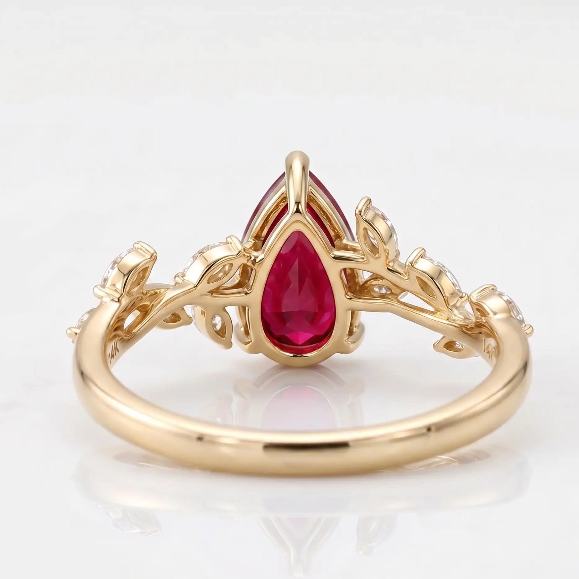 Pear Cut Red Ruby Nature Inspired Engagement Ring with Leaf Accents