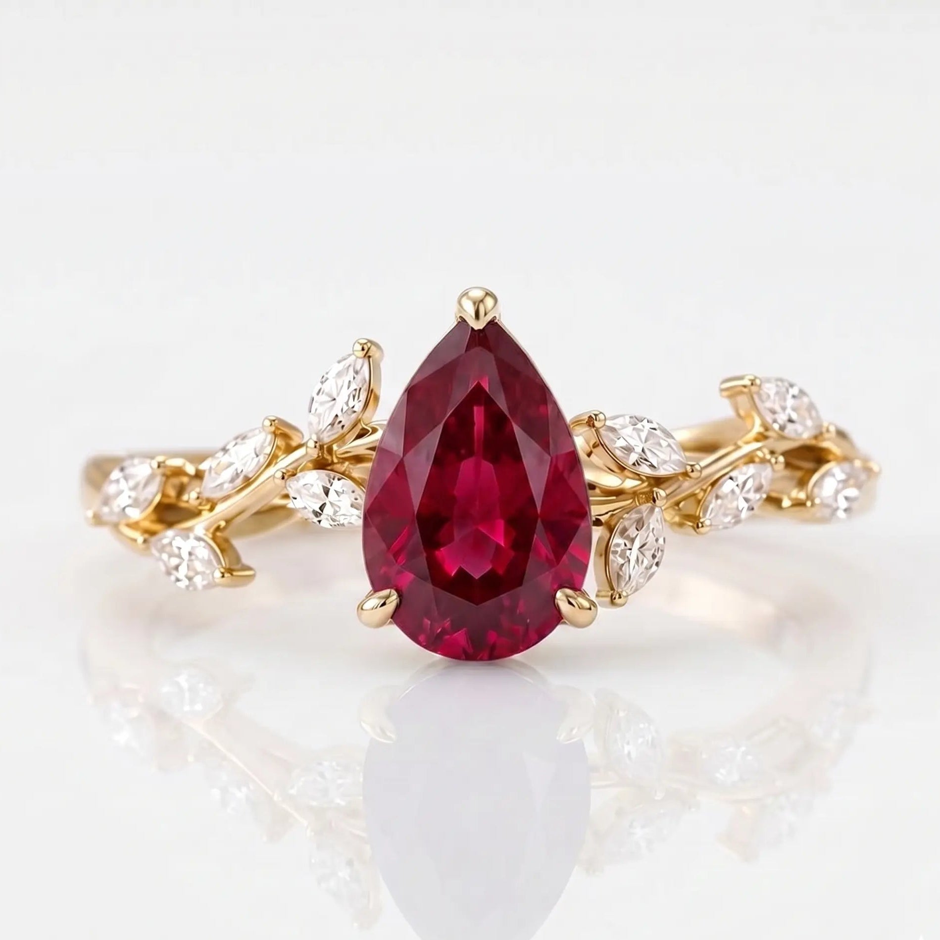 Pear Cut Red Ruby Nature Inspired Engagement Ring with Leaf Accents