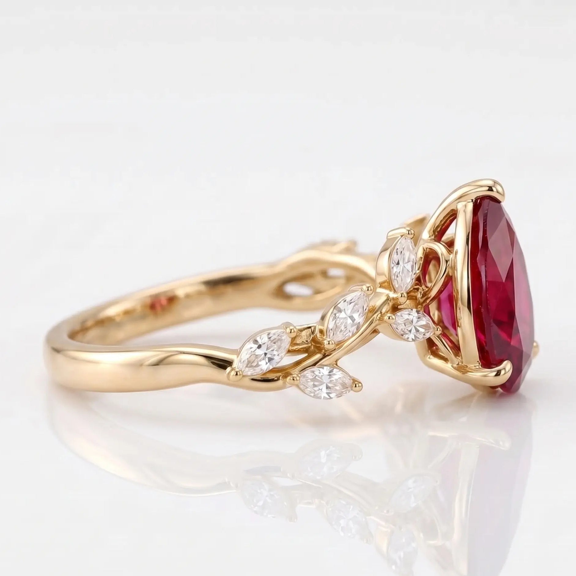 Pear Cut Red Ruby Nature Inspired Engagement Ring with Leaf Accents