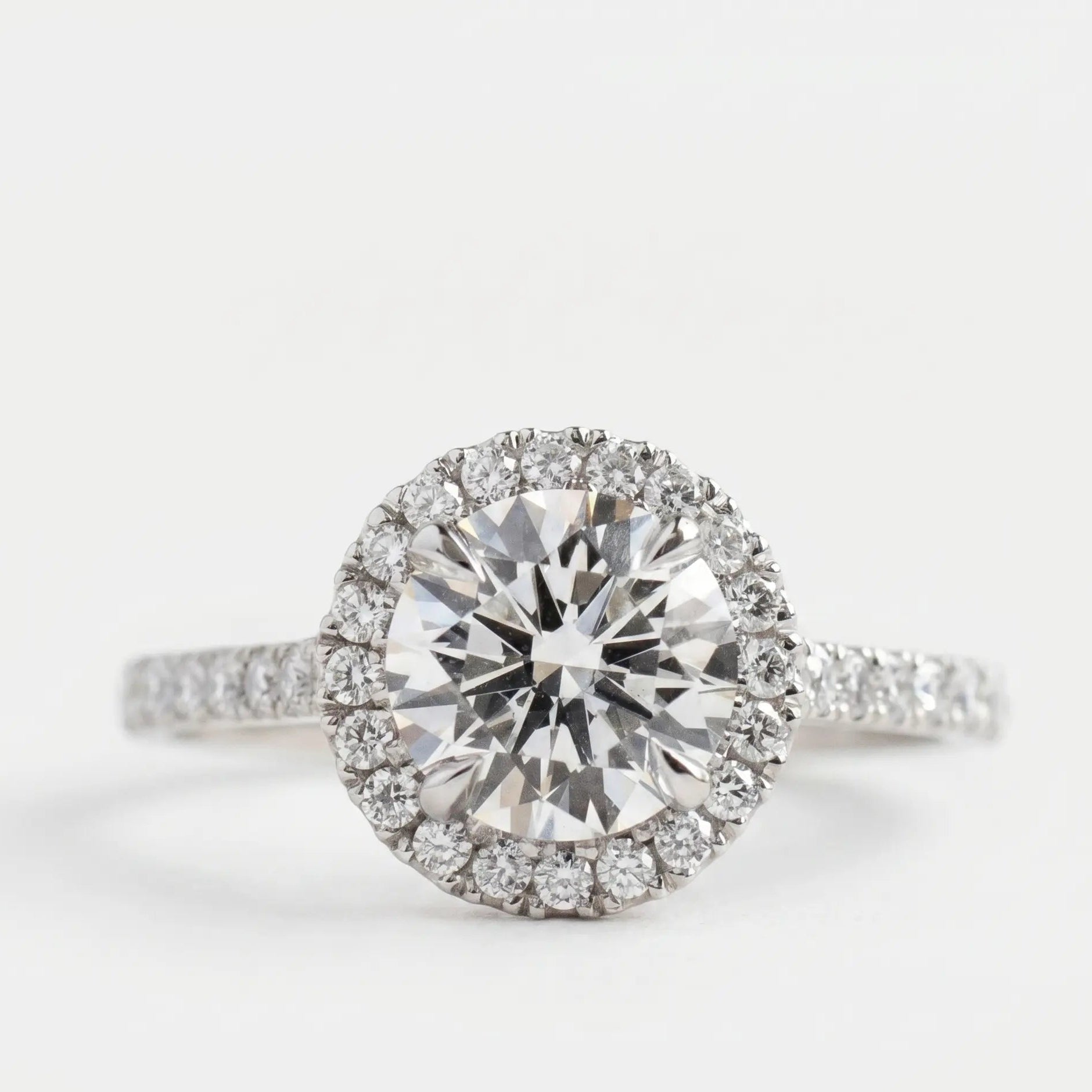 Round Brilliant Moissanite Halo Engagement Ring with Diamond Accents
